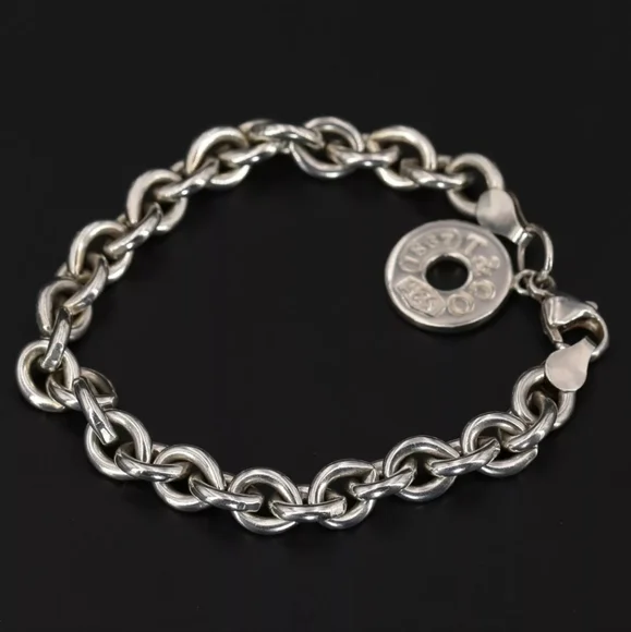 Authentic Tiffany and Co. Sterling Silver Charm Bracelet! - Picture 10 of 14